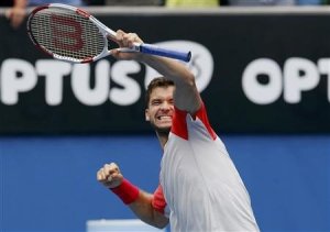 Dimitrov celebrates making the fourth round of a Slam for the first time (thanks to brunchnews.com)