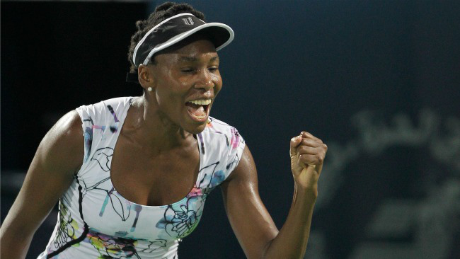 Venus Williams celebrates her fine play in Dubai (thanks to thegrio.com)