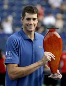Pretty as a picture: Isner holds the very pretty Atlanta trophy (thanks to thehindu.com)