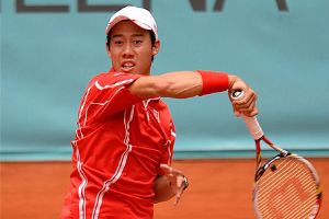 Kei Nisikori follows through on a forehand in his match against Federer (Thanks to timesofindia.indiatimes.com)